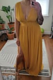 Ordered this for a formal, Indian wedding, as I wanted a nice bright color. This is definitely more on the mustard side, better for a fall wedding. Got an XL based on the size guide and it's a little big overall; I don't mind the waist being a little loose but the bodice is super long so I had to adjust that (thankfully I can do alterations myself). A lot of fabric/coverage at the top so I opted to make little knots and go with a more Grecian look. The length is nice and long and perfect with my 3" heels. Not my #1 dress ever, but since I don't have time to try something else, it'll do. - Lena N.