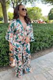 I felt amazing in my jumpsuit and received so many compliments! I initially wanted this a couple of months ago and it was out of stock! Thank goodness it came back in stock right before my trip. Two-day shipping and it was definitely worth it! The perfect length, the perfect fit, I mean, just perfect all around. To be honest, a lot of times I'm a "one wear and done" kind of girl, but this one is definitely going to be seen again!! And again! If you're having doubts about purchasing, don't! Buy the jumpsuit and thank me later. - Angela H.