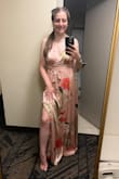 I bought this dress to wear as a bridesmaid at my sister's wedding. It was in San Diego in the middle of summer, so it was a hot day. If there was a breeze this dress would have been perfect, especially with the slit. But even so, the dress was amazing as is with thick material, so it's not see-through. That being said it does make the dress a bit heavy, something to keep in mind. For being on the taller side at 5'8" I did appreciate how long it was, so when I put heels on it was the perfect length. I did use double-sided tape for the bust area but that was just for my own peace of mind. (Pictures were taken at the end of the night). - Tori W.