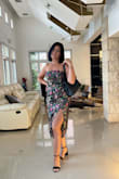 I love the dress so unique so classic I love the material and fits right to size - Saly R.