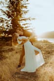 Ordered this for my engagement photos, turned out beautiful! It was light enough when it was 90 degrees out, and very flattering! - Amy H.