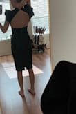 I wore this dress to meet my boyfriend's very conservative family for their grandmother's funeral. The dress fit perfectly and the sleeve ruffles gave it that chic-high fashion- classy- vogue look. My hair was worn down to cover the open part of my back so I didn't show too much skin in church. I Loved it and will def wear it again in the future. - Kasey H.