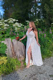 This dress is Hot, Hot, Hot! It makes you look so sexy. It's a great beach wedding dress. It was my first choice for my boho wedding but the moms had some reservations due to being able to see through the skirt part. It has a body suit so you're not naked but it is revealing. I couldn't part with this awesome dress so I packed it, took it on our honeymoon with us to Alaska, and did a photoshoot there. It packs great! It had no noticeable wrinkles and the material is such high quality. The lace is gorgeous! This would be a great location wedding dress too. I'm in LOVE with it and I'm going to find reasons to wear it again and again. I don't care. I am obsessed with the dress. - Nichole P.
