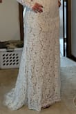 I have some weight I'd like to lose before my wedding, but we haven't even set a date yet! I am SO happy with this purchase. I'm going to have the zipper redone just to ease the stress of it breaking on me. This is a gorgeous dress and the cost is so practical it makes me giddy. My fiance took this picture and I didn't realize it was bunched up, but still gives a good idea. Can't wait to wear it for our wedding!
It won't let me add the whole photo - sorry it's split! - Amy K.