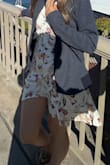This dress looks so much more beautiful in person than it does in the photos. I love the print and the material is really comfortable. I've owned many wrap dresses but this one is by far the most flattering. - Nabila A.