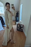 Absolutely gorgeous. The material feels high quality and has some weight to it. I am impressed with the quality of the buttons and loops. I'm wearing this the evening my fiance and I elope and cannot wait ! - Susana K.