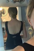 This dress is great! Such good quality for the price (its a nice thick material with a liner) and it fits really well. I usually wear a M/L in things and this dress fit perfectly. Its a little stretchy so I think the medium was a good call to fit my curves. It was not too low in the back and the length was good (maybe an inch or two off the ground). Wore it with heels, a sticky bra, and shape-wear type shorts. Perfect for a black tie wedding. - Kelly T.