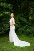 I received a medium size dress for my figure and wore heels that were 4.5 inches. No alterations were needed, but I did have boob inserts sewed in. The dress had amazing quality and fit very well. The low price was the icing on the cake! Highly recommend, highly advise this beautiful dress! - Michaela H.