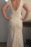 This dress is perfect for my simple, rustic barn wedding. The model pictures do not do it justice. It looks great on someone with real curves. The photos from customers are what sold me.
I went to a bridal store and tried to beat this dress. While I found $1500 dresses I liked, not matched up to this $100 one. And no one would ever be able to tell because it does not look cheap. I added a $16 beaded belt from Amazon and it gave it just the right touch. Also had 2 pairs of boots to choose from.
Medium fit great. Zipper sticks a little at the seam. May need taken in a touch and needs to be hemmed a bit. I am 5'4" and not wearing much of a heel on the boots. - Rebecca C.