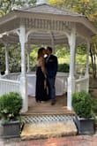 I bought this dress in black to wear to a wedding and I bought it in white to wear to my engagement party and both times I wore it I received so many compliments! It is so comfortable and it's easy to dress up or down! I am on the shorter side and with sandals, the bottom drags a bit but with heels had no problems! - Tiana D.