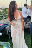 I wore this dress for a party celebrating my recent wedding with friends/colleagues that could not attend our destination wedding. It was beautiful and everyone loved it! It is absolutely see-through, but appropriate for a beach/poolside wedding or celebration. - Andrea V.