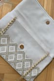 Beautiful bag that you can dress up or down. Bought it to use for a wedding I'm attending. Great size big and can fit a lot of things. There's even an extra zipper for a full-size see photo. Can be used as a clutch or crossover bag. Feel soft, not cheap looking. - Marinelle H.