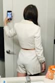 Loved the idea of this and ordered for my bridal shower! I was worried about the shorts back but they actually fit super well and are cute. I wish the top was a bit longer, fits great around, but hits a little higher than my natural waist so a little more abdomen showing than on the model, and doesn't give exactly the same silhouette. I'm going to try it on with a lace cami again to decide if I'll keep it for the bridal shower. The fabric is a nice heavy weight and it's funky cute! Wish the sleeves had buttons so I could roll them up more easily. Overall very fun pieces. - Alexandra B.