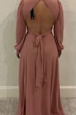 This is a beautiful dress. I ended up sending it back for two reasons. 1. It's way too long. 2. The cleavage area was just a bit too revealing for my comfort level.
Had it not been for the cleavage I would have paid to get it hemmed. If that doesn't bother you then buy! - Linda T.