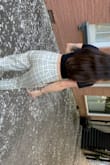 This top is so cute that my girlfriend stole it from me on our trip! It looks great on her too (pictured). The style in the front is cute and I like that it is a good length in the back still. - Megan B.