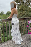 I purchased this dress to wear to a wedding. It's well made and includes a liner - I didn't find it see through at all. I'm smaller chested and see how some larger busted reviewers would have issues with the top. For me, it worked great and having a little more straight up and down build, the fit worked perfectly. - Dawn H.