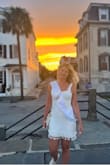 I loved this dress. It fit exactly like I was hoping and the tassels couldn't have been more fun to dance in. I was slightly worried about it riding up, but it stayed exactly where it was supposed to all night. A must get! - Cordelia H.