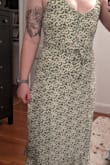 I love this dress but it simply does not allow me to have boobs. I'm usually a 6 ish but even the L was nearly impossible to zip and button. It's so cute and it would be flattering but I'll have to reorder XL when it's back in stock. Size up TWICE if you have tiddies. - Kyle R.
