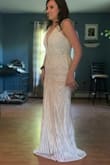 I bought this dress in both small and medium because I thought it was going to be the one. The medium ended up fitting. Just wasn't super flattering on me. The sequins are scratchy on the under arms. It's very sparkly and prom dress-y in person. It's a GORGEOUS dress, just overall wasn't "me." - Kaylin S.