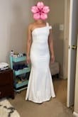 It is a beautiful dress, the quality of the fabric is beautiful and the measurements are perfect. - Paula P.