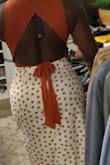 Super cute top! I'm a 3436DD so I wear Brassybra boob tape with this top and it's perfect!
The material isn't thin, it isn't see through and it has some stretch. (the tie straps in the back is thin material though).
I would 10/10 recommend. - Debbie B.