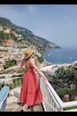 I bought this dress for a trip to Italy and I couldn't be happier. It has a beautiful flowing chiffon layer that has iridescent gold print, and was perfect for a lunch at a fancy patio in Positano. The dress is fully lined which made it heavier than I thought it would be to wear on a warm summer day, but the quality of the dress was great. It packed well and didn't even require steaming. It has an open back, but because of the lining, the dress can be worn braless or with a sticky backless/strapless bra. Loved it! - Katherine R.