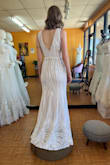 I am obsessed with this dress. I love that the trumpet shape is more subtle. The dress is very comfortable and ended up being very flattering for my body type. It does bunch up awkwardly when you sit down, but that didn't matter to me. I also had the back cut out just because I wanted to show off my back more. The sequins can be a little scratchy and they do fall out a lot, but for me the look and feel outweigh those tiny annoyances. I normally would buy a medium, but the small fit close to perfect for me. - Monica J.