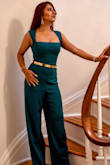 This has to be one of the most satisfying online purchases for clothes for me. Although the recommended size for a petite like me was XS but the jumpsuit ran quite long and required alteration. Other than that the piece is extremely pretty, fits me perfectly, and is very comfortable. The color is vibrant and the material is really good. - Purbitaa M.
