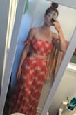 I LOVE this set! I wore it during a bachelorette party in Myrtle Beach. I ordered a large - I'm 6'1" & it fits me perfectly. The fabric does wrinkle easily but nothing a steamer can't fix. I was very comfortable all night & didn't have to wear a bra, which is always a plus. - Devin S.