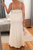 This is a contender. I wanted a simple dress for a small wedding that didn't have a train I would have to worry about. Fits well and it's stretchy and flattering. My only issue is that it's kind of see through, even with nude underwear and it shows stitching. - Jane K.