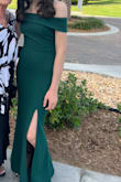 Per the title, this dress HAS to be my favorite dress in my closet. I bought this to wear to a wedding but now I try it on every now and then because I love wearing it so much. It is so comfortable and form-fitting. It looks so gorgeous on and the color looked great with my pale complexion. Not to mention the countless compliments I received wearing this dress! It's not stiff at all and allowed for many hours of dancing. I would definitely recommend this dress to any and everyone. - Jordan W.