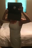I have a bit of a donut belly so I can rarely wear a dress that is so fitted. Not only does it make my braless boobs look good, it somehow hides my belly! Ordered a small one and it's perfect. Color is true to the picture. Hem hits me about 4" above the knee. - Lisa S.