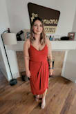 I wasn't prepared for how HOT !!! I looked in this dress! I bought an xl and it fits perfectly. I love the loose fit around my tummy; I could get away without wearing Spanx. It's a tasteful amount of cleavage while also looking classy and sexy. 10/10, I plan to purchase in black too. - Samantha P.