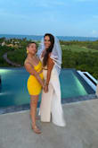 I wore this in Cancun for my bachelorette and it was the perfect combo of bridal but sooooo fun. The pants have a high slit on both legs so I didn't get too hot and the shorts under covered even my big booty.  I felt like the pants were very slimming and perfectly high waisted. I didn't have to get them hemmed because I am taller but I did wear a small heel. The top is super cute and adjustable so you can make it tighter or looser depending on your bust. I got a ton of compliments on this and I can't wait to wear it again! Buy this! - Jenna R.