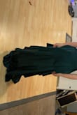 I really love the dress the fabric feels really nice and the color is perfect! It's at least 6 inches too long which can be altered but the biggest problem I have is the gapping at the side book just under the arms. That little bit of gap kind of adds a frumpiness to the dress. - Cassandra K.