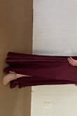 I normally wear a size 8 in formal wear. I ordered a medium but it was really tight in the midsection and very loose in the cleavage area. The quality of the dress was great. It was very soft and silky. The color was spot on. - Kelli G.