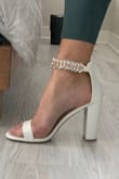 I like that there is no buckle, and the ankle band is larger than usual on this type of heel, which makes it comfy. I will use these shoes for my wedding! - Mailys R.
