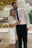 I wore this dress for my wedding shower and it fit great! I chose a medium just so my shoulders and arms wouldn't feel too tight, and I'm happy that I did. The material was comfortable and I loved the length and small slit in the back. Would definitely recommend it. - Ellen L.