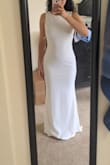 Dress fits well! Didn't love the style for my reception because I was going for something more flowy, though most of my bridesmaids were strong advocates for this one! Form fitting, not very forgiving over the tummy and I wouldnt have been able to wear any shapewear stealthily, but high quality material & good stretch. - Adriana C.