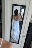 There is nothing wrong with the dress, just the style just doesn't hug your figure or look finished at the waist in my opinion. Might look nice with a belt. - Adriana C.