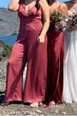 Wore this to officiate a friend's wedding. It was very comfortable and easy to wear. Had to shorten it and had to use fashion tape to keep the thicker side of the top in place - otherwise, I would have definitely flashed a lot of people. As a result, it was a bit painful/ uncomfortable to use the restroom since I had to unstick the jumpsuit from my body. - Karla M.