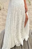I was looking for a dress for a beach wedding. I wanted it to be somewhat casual. I went through several dresses. Finally a week before my wedding I found it! Lulus sent it very quickly. I tried it on and it was perfect! Usually, I wear a medium, but I was finding wedding dresses run a little small so I ordered a large. It does give, so I might have gotten away with a medium. I highly recommend this dress and company. I had to return two other dresses and they made it very easy!! - Betsy W.