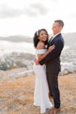 After a complicated process of finding what dress I wanted for my wedding portrait, this dress came in the save me and my wallet. The second I try it on I knew it was perfect. I did not have a wedding but took wedding pictures in Greece. The material is tick and has a decent stretch. Easy to travel with and doesn't wrinkle. The length was perfect for me. The sleeves can be a little restricted but that's normal for an off shoulder. Simple and elegant. it was perfect for what I wanted. - Massiel L.