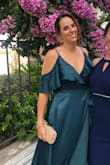 Love the fabric. It's not heavy and very comfortable. I was wearing flat shoes but I could have worn heels too.
The bracket on the chest was not properly situated but it was very easy to unstitch and stitch it back up.
The only bad thing is I order it from Spain and I had to pay like $40 extra in customs. Otherwise it is worth the money. - Monica M.