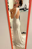 This dress is gorgeous and such a great price. The quality is good, fabric is nice.
Sizing is weird though.
I originally ordered a Medium. It was very tight in the hips as the lace is non stretch. It fit great everywhere else.
I exchanged it for a Large and there was NO difference in the hips, but upper portion was larger.
I called and told them I thought the Large was a flawed garment so they sent out another large to see if they were all like that. The second large was a bit bigger but there should be at least a 2" increase between M and L in all body width and there isn't.
Basically, if you have wider hips, this dress will probably not fit you. It was created for ladies without curves.
I work in apparel development so I can sew and I will be adding additional lace applique in the hips area so that I can let the dress out in that area as the seam allowance used on this dress is incredibly minimal. - Sarah G.