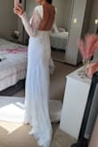 Sizing was tricky for me on this one. The shoulder button would not close but the sleeves ran large. Every other part fit like a glove. Quality of the dress was top-notch. - Briar H.