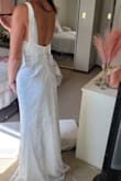 The adjustable straps are great but I felt like my chest wasn't supported. The quality of the material is very high, hard to imagine the cost is so low. For me, the slit went a little high whether I was standing still or moving around but the overall length was perfect. - Briar H.