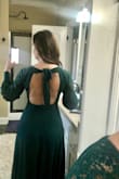 I initially ordered a medium as this is my usual go-to size. Although it would have worked, it was a little looser in the waist and hips than I prefer. I exchanged it for a small. I got the dark green, and the pictures don't do justice. This dress looks more beautiful in person. I can't wait to wear it to my daughter's wedding. - Lisa A.