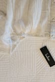 I love the dress but the blouse neckline is not properly done. It's pulling to the side. I have attached the pictures. I am giving it 2 stars because of the neckline otherwise it is beautiful dress. - Mandeep S.