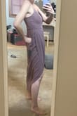 It's a beautiful, formal, romantic dress. It ran a little large and made my bust seem a lot smaller (I was wearing an adhesive cup bra). Love the color and the style but it didn't quite do it for me, I did not end up wearing it, and think I will return it. If I wore dresses more often I would keep it because it truly is a beautiful piece, but I simply do not need another dress that I feel pretty indifferent about being a sporadic dress-wearer. - Rose A.